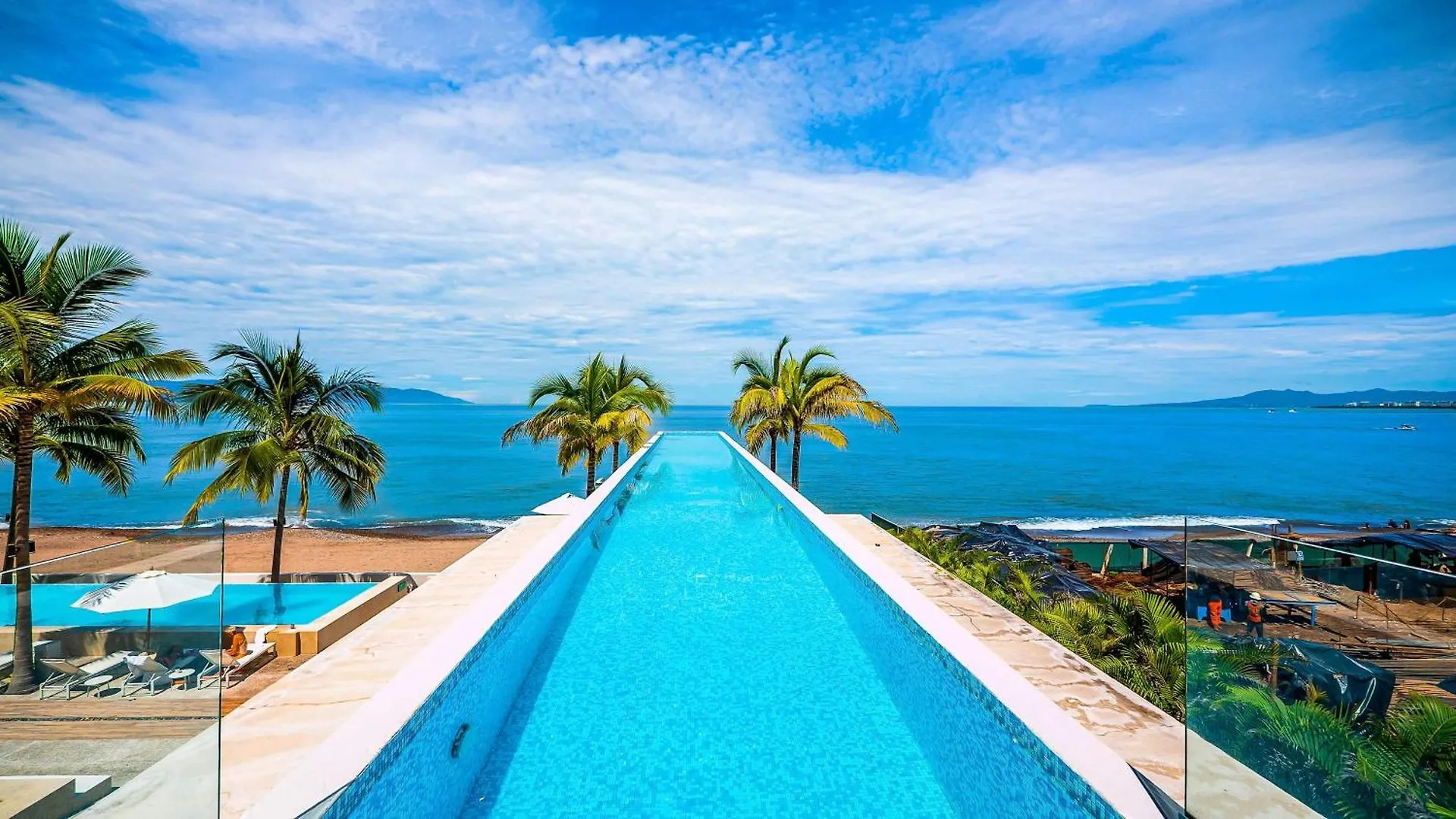 Stunning Beachfront Condo - Sea Views & Pools Puerto Vallarta